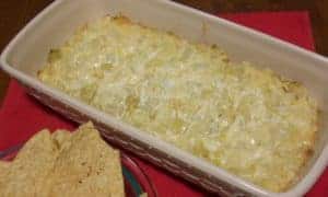 An amazingly easy, and delicious, cheesy artichoke dip that's sure to be a hit.